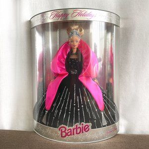 Happy holidays Barbie doll NEW in box. Black-pink sparkly dress. Cute!